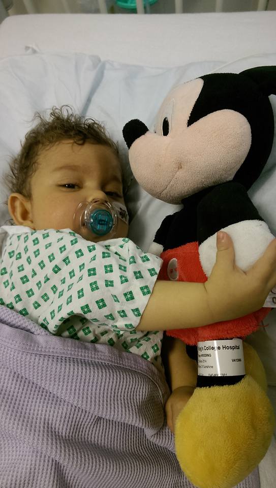 Fitting in a cuddle with Mickey before going down to theatre. And yes, Mickey has a name badge on...